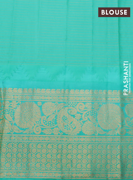 Pure gadwal silk saree deep purple and teal green shade with allover zari checked pattern & zari buttas and temple deisgn zari woven border