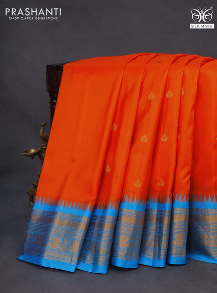 Pure gadwal silk saree orange and cs blue with zari woven buttas and temple deisgn zari woven border