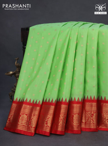 Pure gadwal silk saree light green and red with zari woven buttas and temple deisgn zari woven border