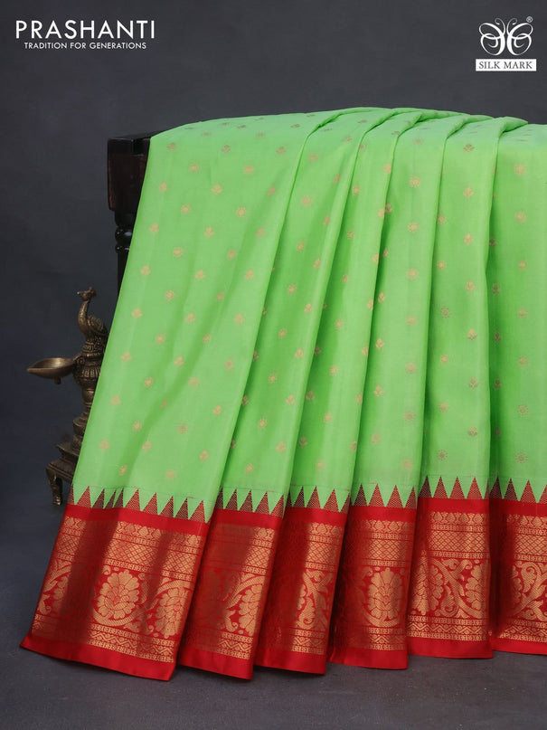 Pure gadwal silk saree light green and red with zari woven buttas and temple deisgn zari woven border