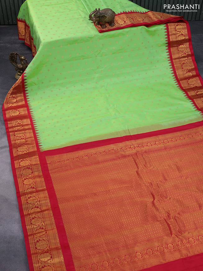 Pure gadwal silk saree light green and red with zari woven buttas and temple deisgn zari woven border