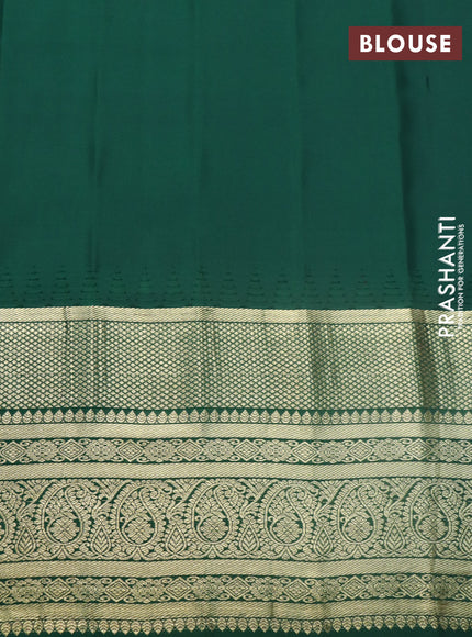 Pure gadwal silk saree pink and green with zari woven buttas and temple deisgn paisley zari woven border