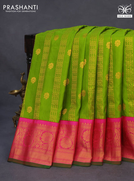 Pure gadwal silk saree green and pink with allover zari weaves & buttas and zari woven border