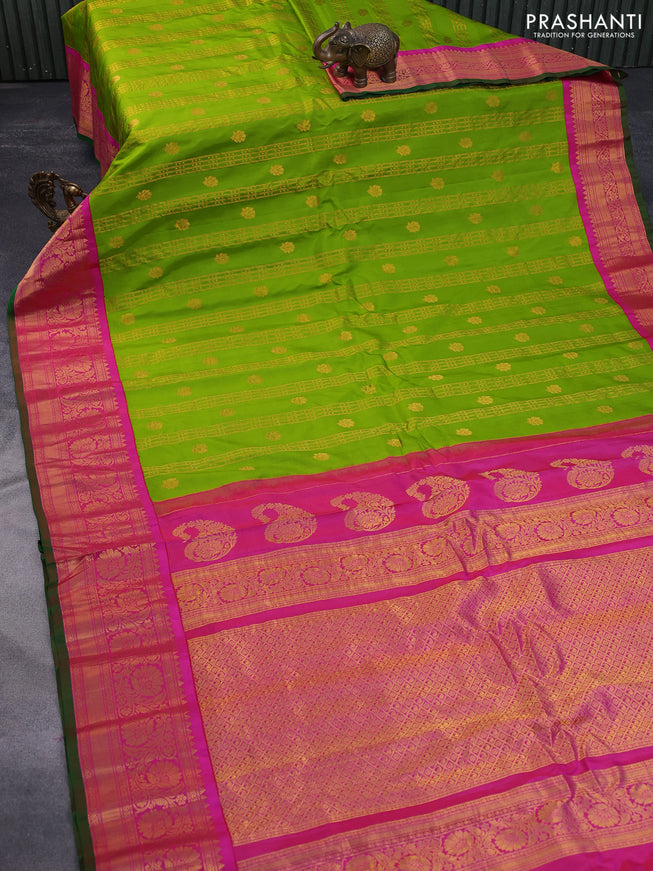 Pure gadwal silk saree green and pink with allover zari weaves & buttas and zari woven border