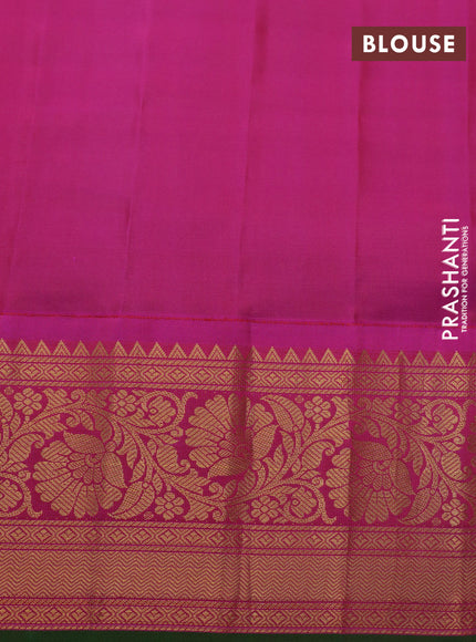 Pure gadwal silk saree green and pink with allover zari weaves & buttas and zari woven border