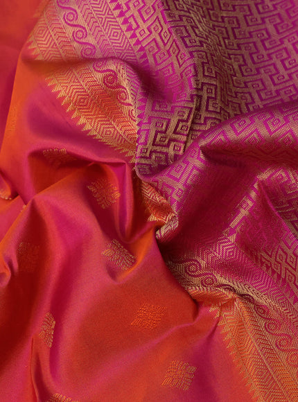 Pure kanchipuram silk saree dual shade of pinkish orange and pink with allover zari woven buttas and annam zari woven border