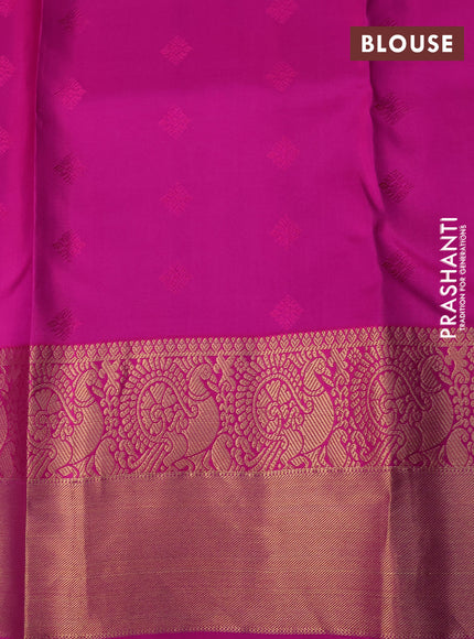 Pure kanchipuram silk saree dual shade of pinkish orange and pink with allover zari woven buttas and annam zari woven border