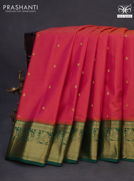 Pure gadwal silk saree dual shade of pinkish orange and green with zari woven buttas and zari woven border