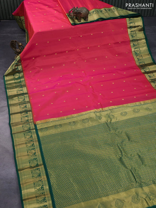 Pure gadwal silk saree dual shade of pinkish orange and green with zari woven buttas and zari woven border