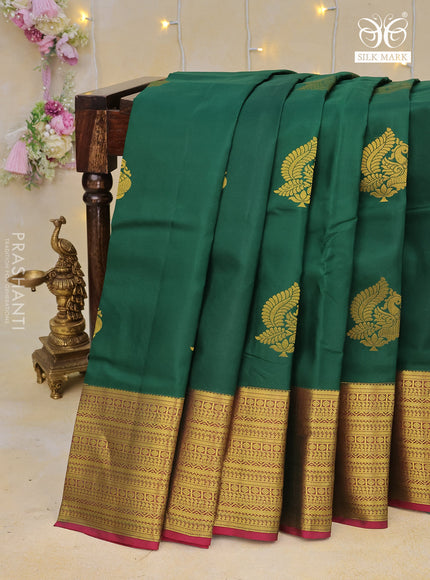 Pure kanchipuram silk saree green and magenta pink with zari woven annam buttas and long zari woven border