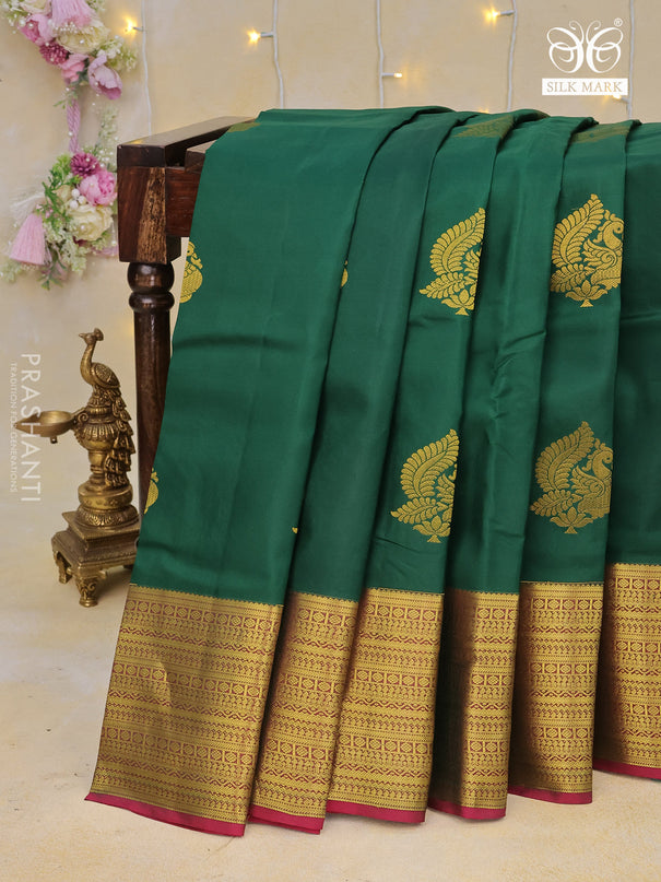 Pure kanchipuram silk saree green and magenta pink with zari woven annam buttas and long zari woven border