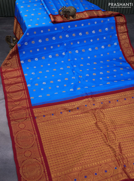 Pure gadwal silk saree cs blue and maroon with annam zari woven buttas and zari woven border