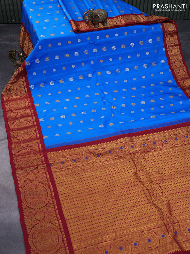 Pure gadwal silk saree cs blue and maroon with annam zari woven buttas and zari woven border