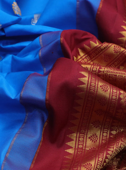 Pure gadwal silk saree cs blue and maroon with annam zari woven buttas and zari woven border