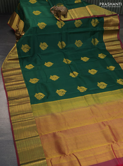 Pure kanchipuram silk saree green and magenta pink with zari woven annam buttas and long zari woven border