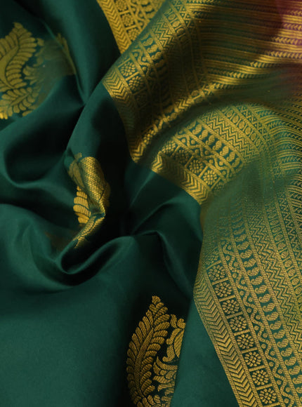 Pure kanchipuram silk saree green and magenta pink with zari woven annam buttas and long zari woven border