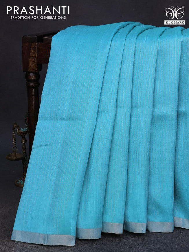 Pure raw silk saree light blue and mustard yellow with allover silver zari weaves and silver zari woven piping border