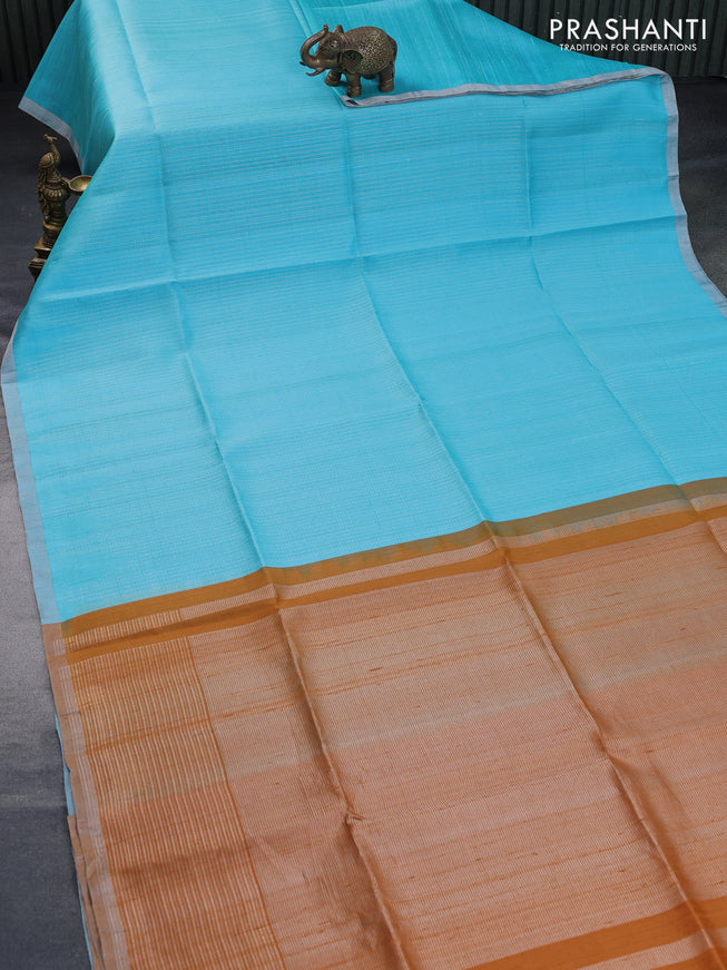 Pure raw silk saree light blue and mustard yellow with allover silver zari weaves and silver zari woven piping border