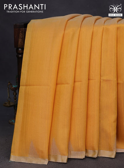 Pure raw silk saree yellow and pink with plain body and temple deisgn silver zari woven border