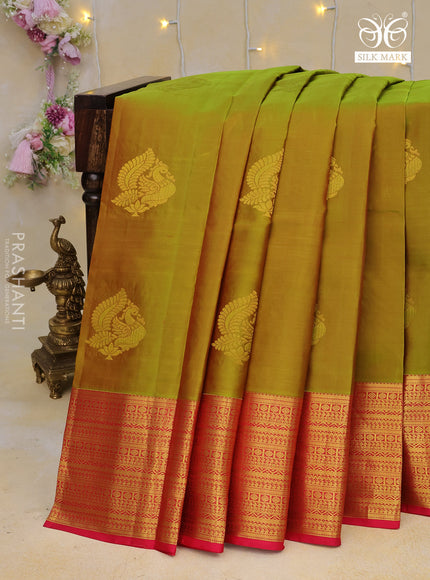 Pure kanchipuram silk saree dual shade of mehendi green and pink with zari woven annam buttas and long zari woven border