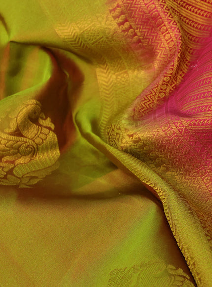 Pure kanchipuram silk saree dual shade of mehendi green and pink with zari woven annam buttas and long zari woven border