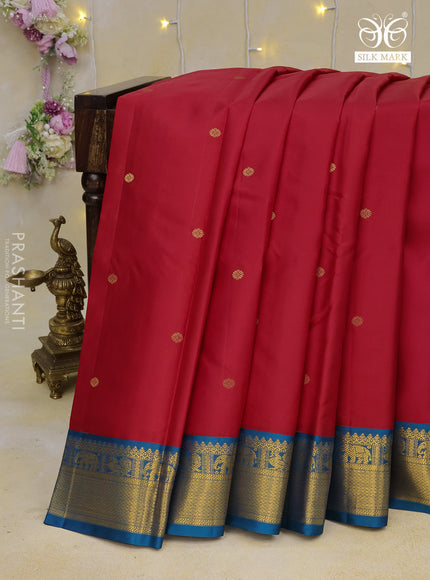 Pure kanchipuram silk saree red and peacock blue with zari woven buttas and zari woven korvai border