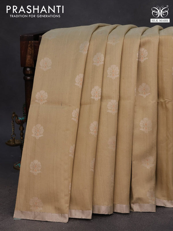 Pure raw silk saree beige and pink with allover floral zari woven buttas and silver zari woven border