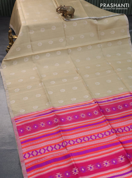 Pure raw silk saree beige and pink with allover floral zari woven buttas and silver zari woven border