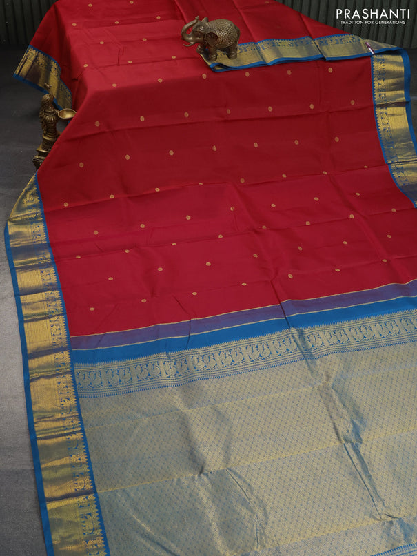 Pure kanchipuram silk saree red and peacock blue with zari woven buttas and zari woven korvai border