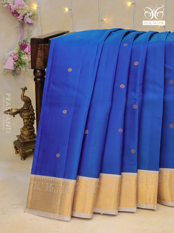 Pure kanchipuram silk saree dual shade of blue and beige with zari woven buttas and zari woven korvai border