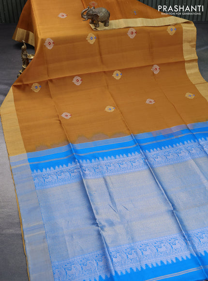 Pure raw silk saree cs blue and mustard yellow with silver & gold zari woven buttas and zari woven border