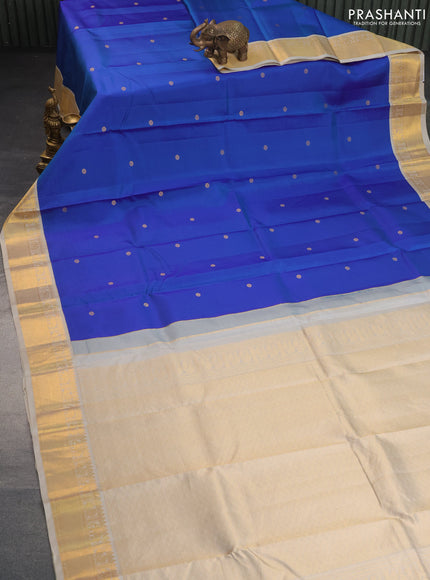 Pure kanchipuram silk saree dual shade of blue and beige with zari woven buttas and zari woven korvai border