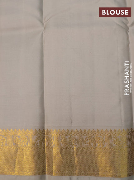 Pure kanchipuram silk saree dual shade of blue and beige with zari woven buttas and zari woven korvai border