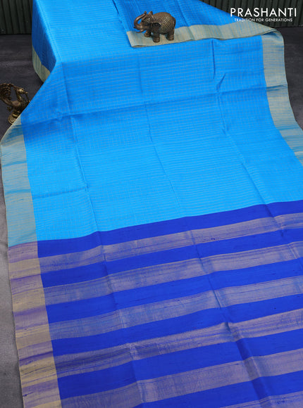 Pure raw silk saree cs blue and blue with allover zari checks and zari woven border