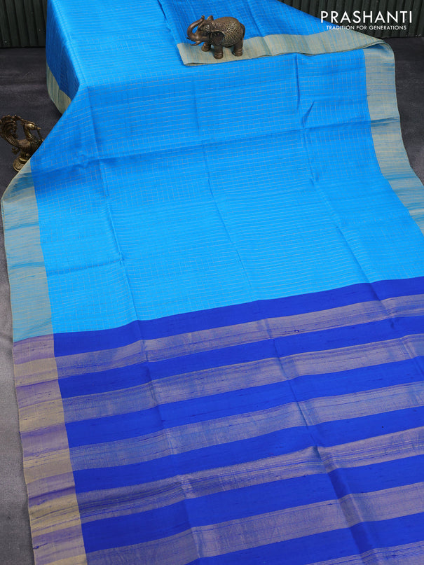 Pure raw silk saree cs blue and blue with allover zari checks and zari woven border