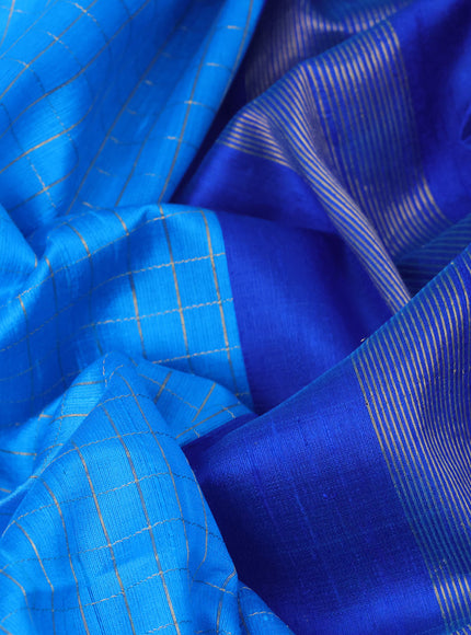 Pure raw silk saree cs blue and blue with allover zari checks and zari woven border