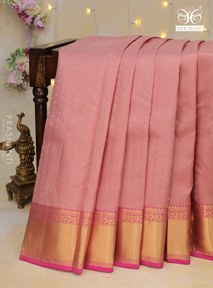 Pure kanchipuram silk saree pastel brown and pink with allover zari woven butta weaves and zari woven border