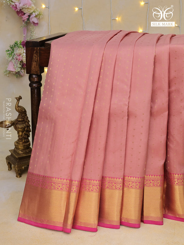 Pure kanchipuram silk saree pastel brown and pink with allover zari woven butta weaves and zari woven border