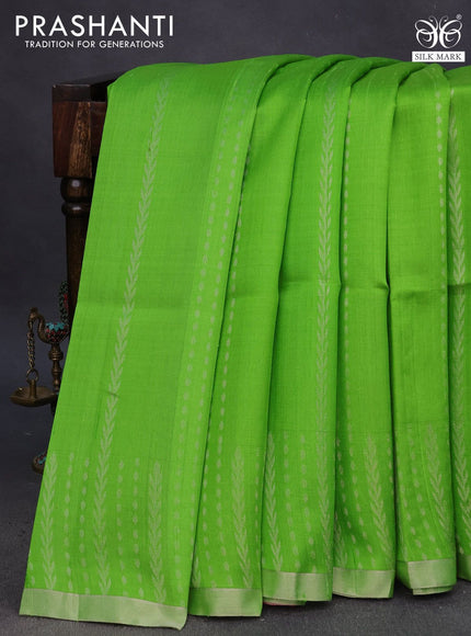 Pure raw silk saree light green and pink with allover silver zari weaves and silver zari woven border