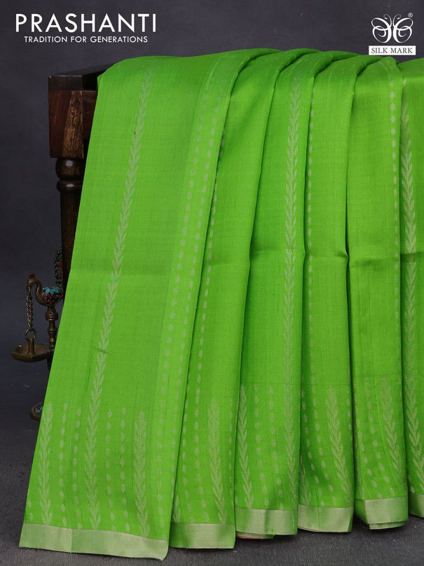 Pure raw silk saree light green and pink with allover silver zari weaves and silver zari woven border