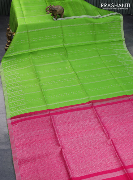 Pure raw silk saree light green and pink with allover silver zari weaves and silver zari woven border