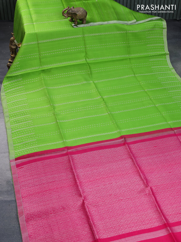 Pure raw silk saree light green and pink with allover silver zari weaves and silver zari woven border