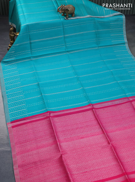 Pure raw silk saree teal blue and pink with allover silver zari weaves and silver zari woven border