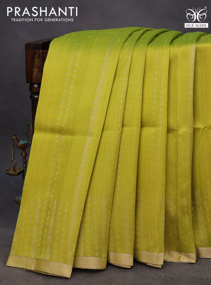 Pure raw silk saree lime green and pink with allover silver zari weaves and silver zari woven border