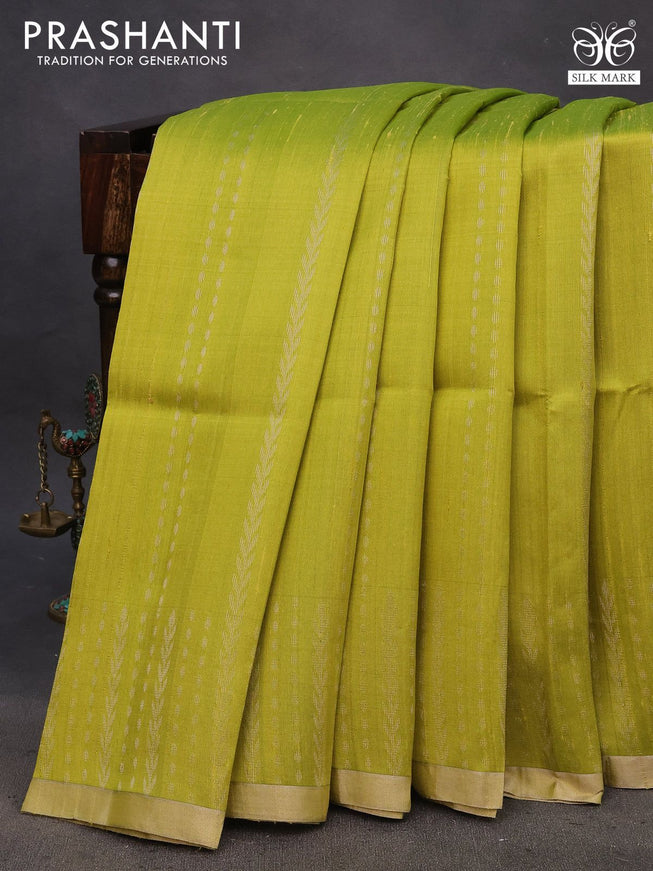 Pure raw silk saree lime green and pink with allover silver zari weaves and silver zari woven border