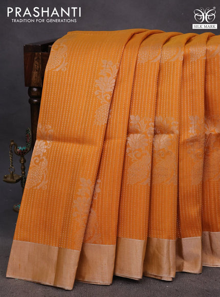 Pure raw silk saree mustard yellow and teal blue with allover silver zari weaves & buttas and silver zari woven border