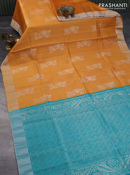 Pure raw silk saree mustard yellow and teal blue with allover silver zari weaves & buttas and silver zari woven border