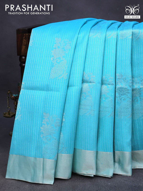 Pure raw silk saree light blue and mustard yellow with allover silver zari weaves & buttas and silver zari woven border