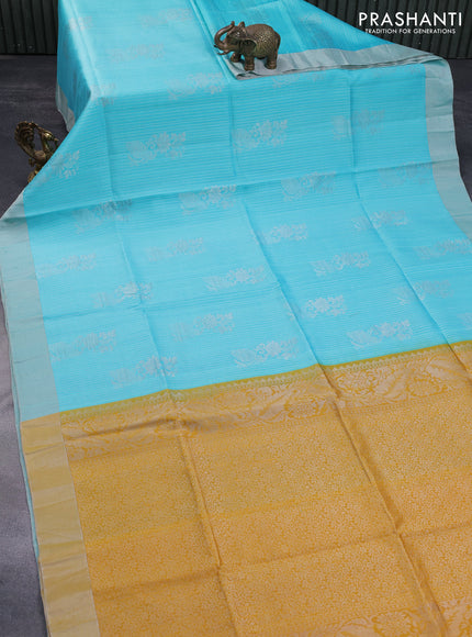 Pure raw silk saree light blue and mustard yellow with allover silver zari weaves & buttas and silver zari woven border