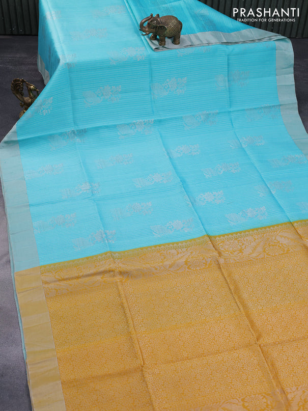 Pure raw silk saree light blue and mustard yellow with allover silver zari weaves & buttas and silver zari woven border